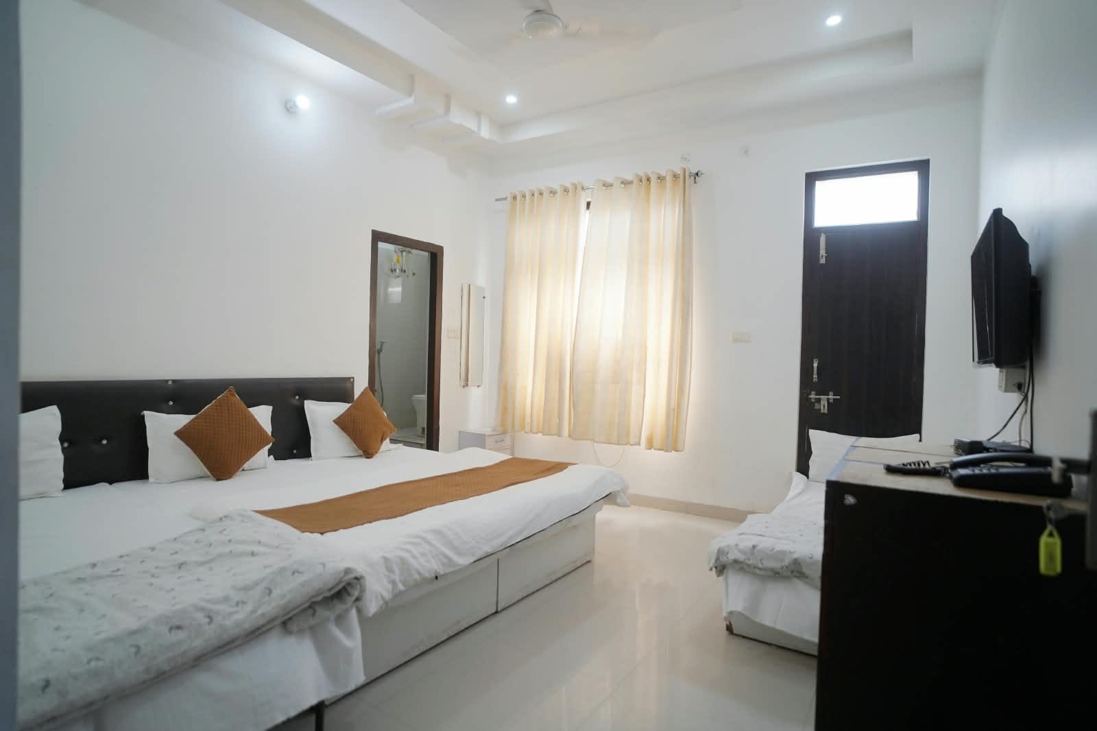 Deluxe Quad Room